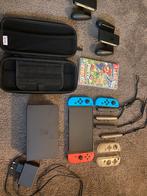 Nintendo Switch Oled Blauw/Rood met Mario Party Superstars, Spelcomputers en Games, Spelcomputers | Nintendo Switch, Ophalen of Verzenden