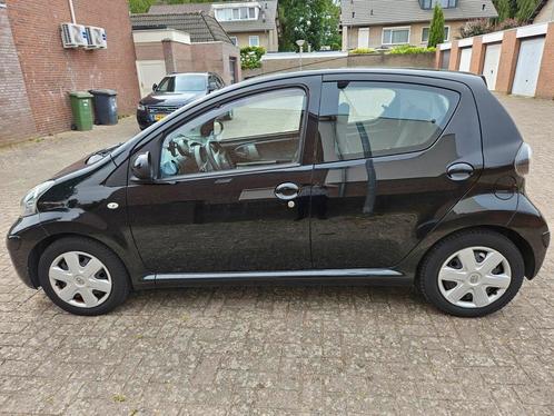 Toyota Aygo met veel extra's 1.0 12V Vvt-i 5DRS 2011 Zwart, Auto's, Toyota, Particulier, Aygo, ABS, Achteruitrijcamera, Airbags