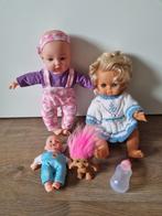 4 popjes. 2 kleine en 2 grote. Links bovenin is met geluid, Ophalen of Verzenden, Zo goed als nieuw, Pop