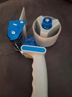 Plakband apparaat, Ophalen