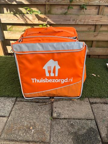 Thuisbezorg tas met extra,s, zie foto,s beschikbaar voor biedingen