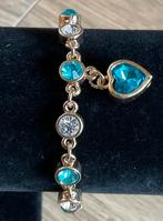 Armbandje, goudkleur en blauwe steen. Nieuw!!, Ophalen of Verzenden, Nieuw