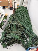 7 halve kerstbomen en 1 hele kerstboom, Ophalen