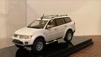 Mitsubishi Pajero Sport 2013 White Mitsubishi-Motors 1/43, Ophalen of Verzenden, Zo goed als nieuw, Auto, Overige merken