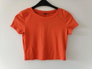 Oranje crop top maat M