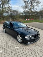 Bmw E36 323i 6 Cilinder 2.5liter M-Pakket 1996 VERKOCHT!!, Achterwielaandrijving, Zwart, 192 pk, Leder en Stof