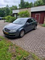 Volkswagen Jetta Comfortline 1.9 TDI 77KW 2009 Grijs Clima, Voorwielaandrijving, Parkeersensor, 4 cilinders, Bedrijf
