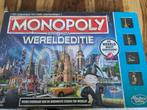 Monopoly wereld editie, Hobby en Vrije tijd, Gezelschapsspellen | Bordspellen, Ophalen of Verzenden, Zo goed als nieuw