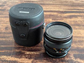 Konica Hexanon AR 2,8 35mm goothoeklens met koker. beschikbaar voor biedingen