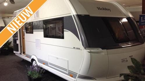 Hobby De Luxe 495 UL, Caravans en Kamperen, Caravans, tot en met 4, Rondzit, Hobby, 2 aparte bedden, Overige, Gascomfoor, Hordeur