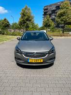 Opel Astra 1.0 Turbo 77KW 5D 2016 Bruin, Auto's, Opel, Stof, Zwart, Bruin, 23 km/l