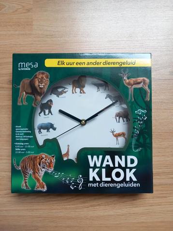 Wandklok met echte jungle dieren geluiden beschikbaar voor biedingen