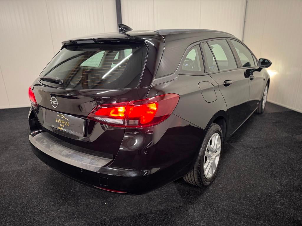 Opel Astra Sports Tourer 1.0 Edition 2017 105PK CARPLAY/CAME, Voorwielaandrijving, Stof, Gebruikt, 1178 kg
