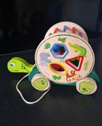 Houten vormenblok rijdende schildpad, Ophalen