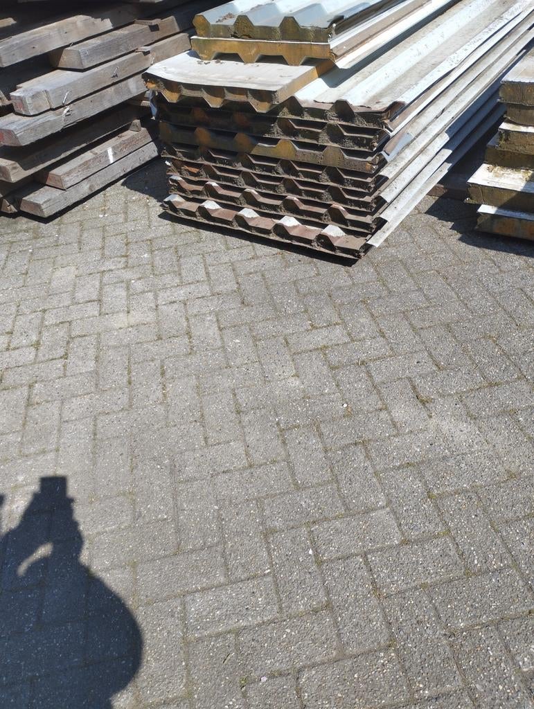 Sandwich dakpanelen, Ophalen