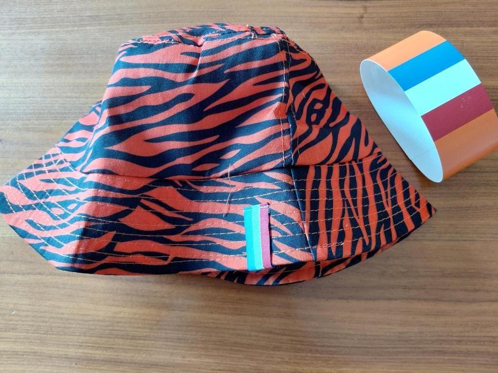 Oranje tijgerprint hoedje. Nieuw., Ophalen of Verzenden, Nieuw, Hoed of Pruik, Oranje of Koningsdag
