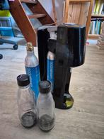 SodaStream met twee cilinders en twee flessen, Ophalen
