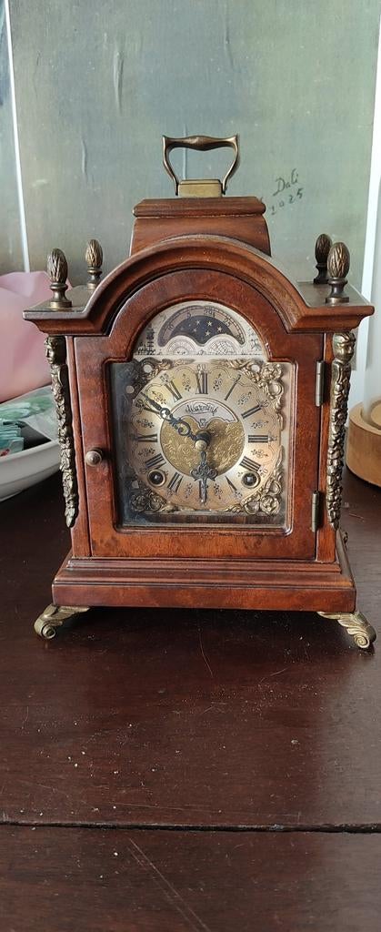 Warmink Wuba tafelklok, Ophalen