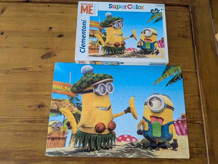 Puzzel Minions 104 stukjes Clementoni netjes 100, Kinderen en Baby's, Speelgoed | Kinderpuzzels, Zo goed als nieuw, 6 jaar of ouder
