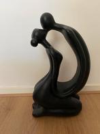 Te koop stenen beeld, Ophalen
