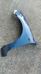 Linker blauw voorscherm Mazda 3 uit 2004, Ophalen of Verzenden