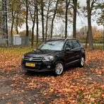 Volkswagen Tiguan 1.4 TSI • 2014 • Airco • Stoelverw • Trekh, Voorwielaandrijving, 15 km/l, 74 €/maand, Zwart