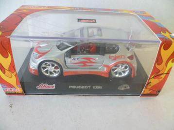 Schuco Peugeot 206 in doos 1:32 modelauto.  beschikbaar voor biedingen