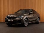 BMW X6 M50i 22"-H/K-HUD-DRIVE+-PARK+ (bj 2019, automaat), 12 maanden, Gebruikt, 2210 kg, 4395 cc