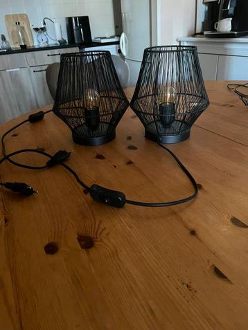 Zwarte draad lampjes beschikbaar voor biedingen