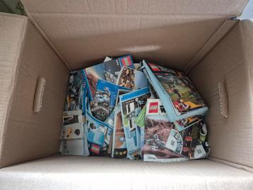 doos vol lego boekjes  beschikbaar voor biedingen