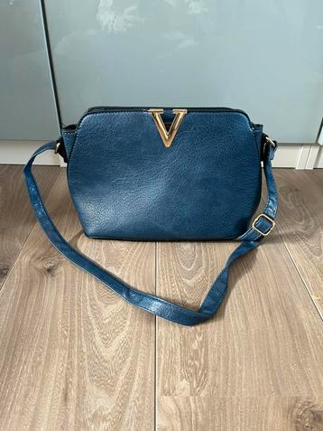 NIEUW: Blauwe schoudertas beschikbaar voor biedingen