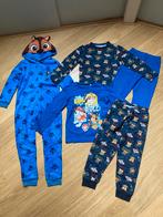 Pakket Paw Patrol pyjama’s en onesie maat 122/128 ZGAN, Ophalen of Verzenden, Zo goed als nieuw, Jongen, Nacht- of Onderkleding