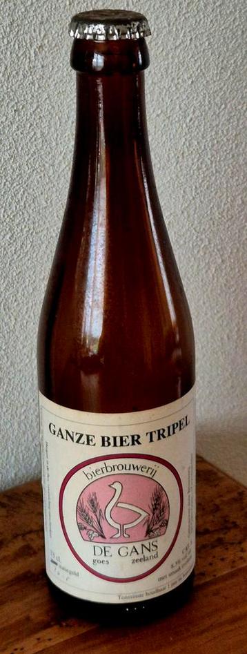 Mooi leeg flesje plus vol bier van DE GANS Goes Zeeland beschikbaar voor biedingen