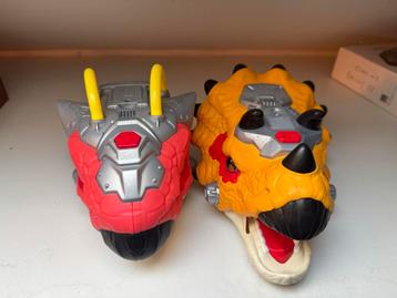 2x VTech Switch & Go Dinos - T-Rex & Triceratops beschikbaar voor biedingen