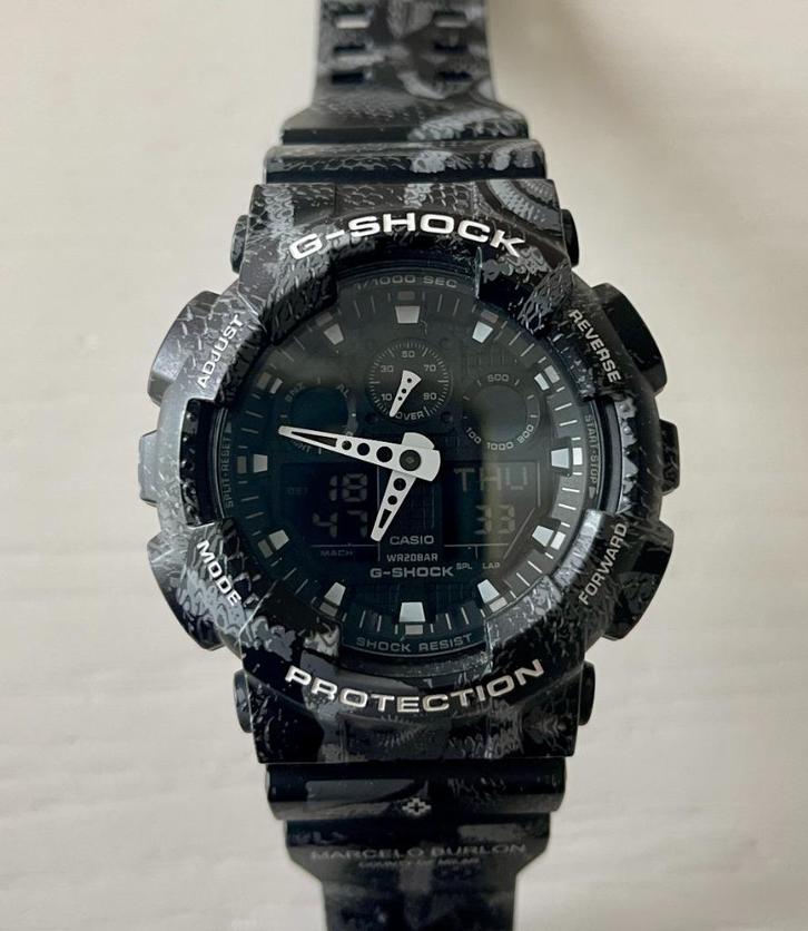 Casio G-Shock GA-100MRB-1AER "Marcelo Burlon", Sieraden, Tassen en Uiterlijk, Horloges | Dames, Zo goed als nieuw, Polshorloge