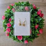 Goudkleurige rvs oorbellen. 'Zeester', Ophalen of Verzenden, Zo goed als nieuw, Goud, Overige materialen
