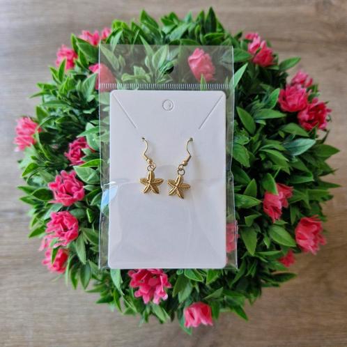 Goudkleurige rvs oorbellen. 'Zeester', Sieraden, Tassen en Uiterlijk, Oorbellen, Zo goed als nieuw, Overige materialen, Goud, Ophalen of Verzenden