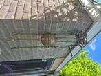 Antieke kerosene lamp, Ophalen