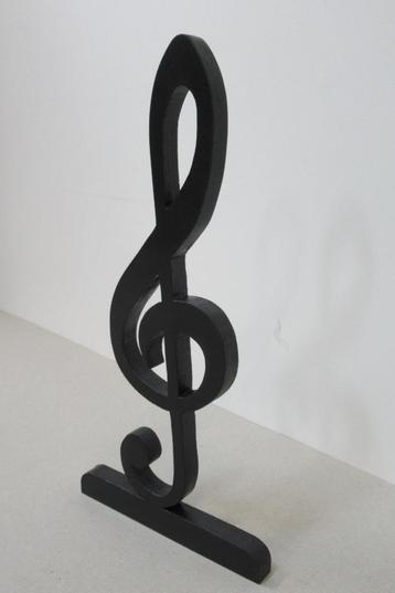 Houten muzieksleutel beschikbaar voor biedingen