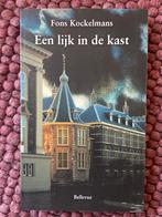 Een lijk in de kast - Fons Kockelmans, Ophalen of Verzenden, Zo goed als nieuw