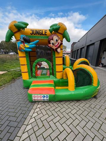 Mini met Slide Jungle Springkussen te koop beschikbaar voor biedingen