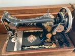 Antieke Singer handnaaimachine, Ophalen