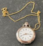 Antiek zilveren dameshorloge aan vergulde ketting, Overige merken, 1900 tot 1930, Ophalen of Verzenden, Zilver