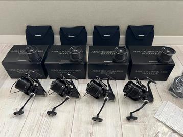 4 x Shimano Aero Technium Mgs XTD 14000 incl spoelen NWST!! beschikbaar voor biedingen