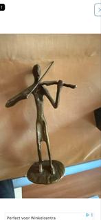 Bronzen beeld van een violist, Ophalen