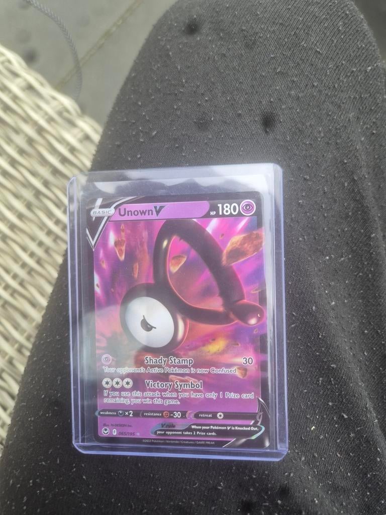 Unown V 65 silver tempest, Hobby en Vrije tijd, Verzamelkaartspellen | Pokémon, Zo goed als nieuw, Ophalen of Verzenden