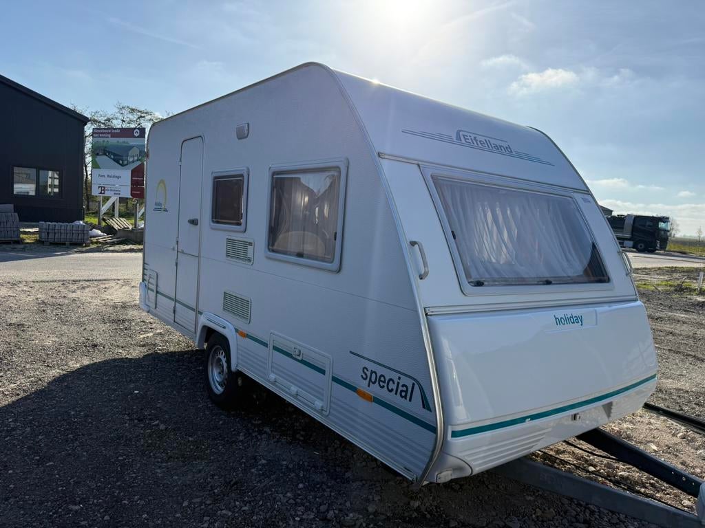 Eifelland Holiday 395 Special | Mover | Luifel, Caravans en Kamperen, Caravans, Treinzit, Dwarsbed, 500 - 750 kg, Schokbreker
