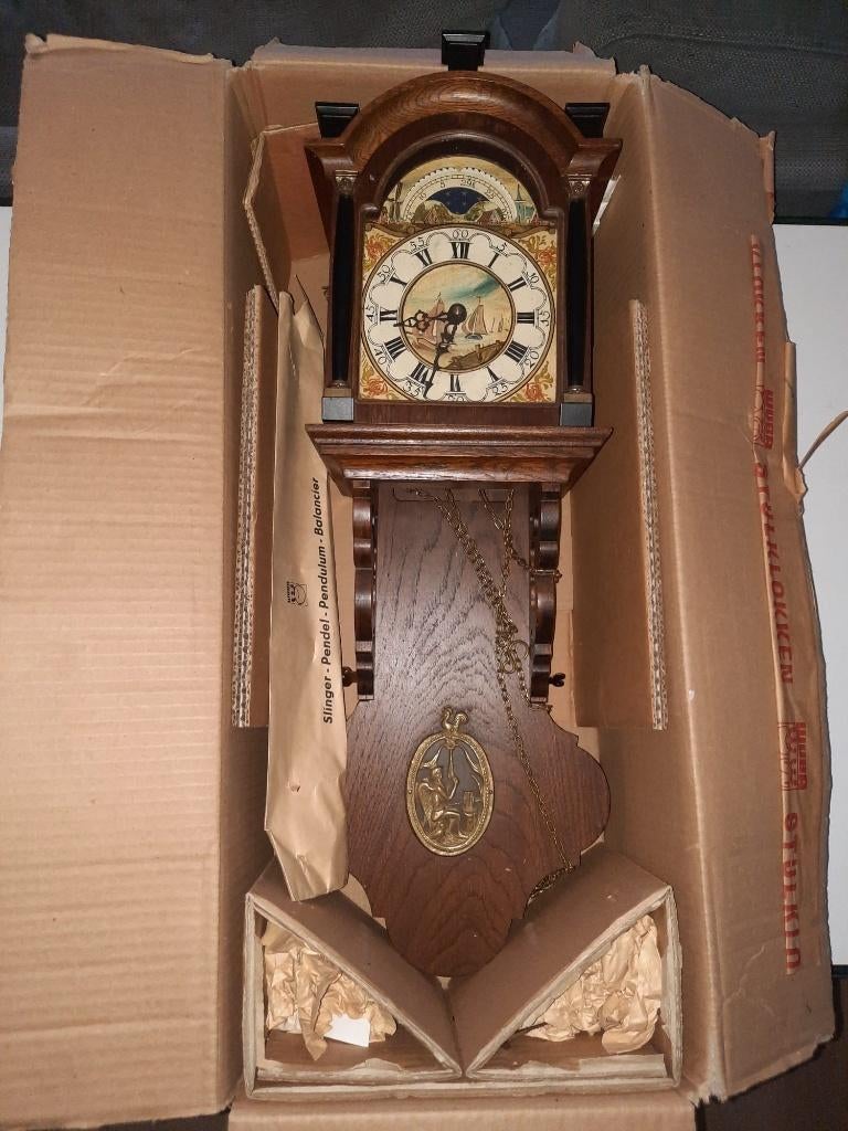 Een schitterende Friese staartklok,klok van Warmink (WUBA), Ophalen