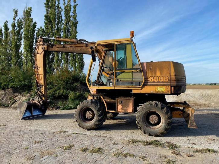 Case Poclain 688B, Zakelijke goederen, Machines en Bouw | Kranen en Graafmachines, Wiellader of Shovel, Ophalen