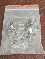 1 zakje RVS oor slangklemmen., Ophalen